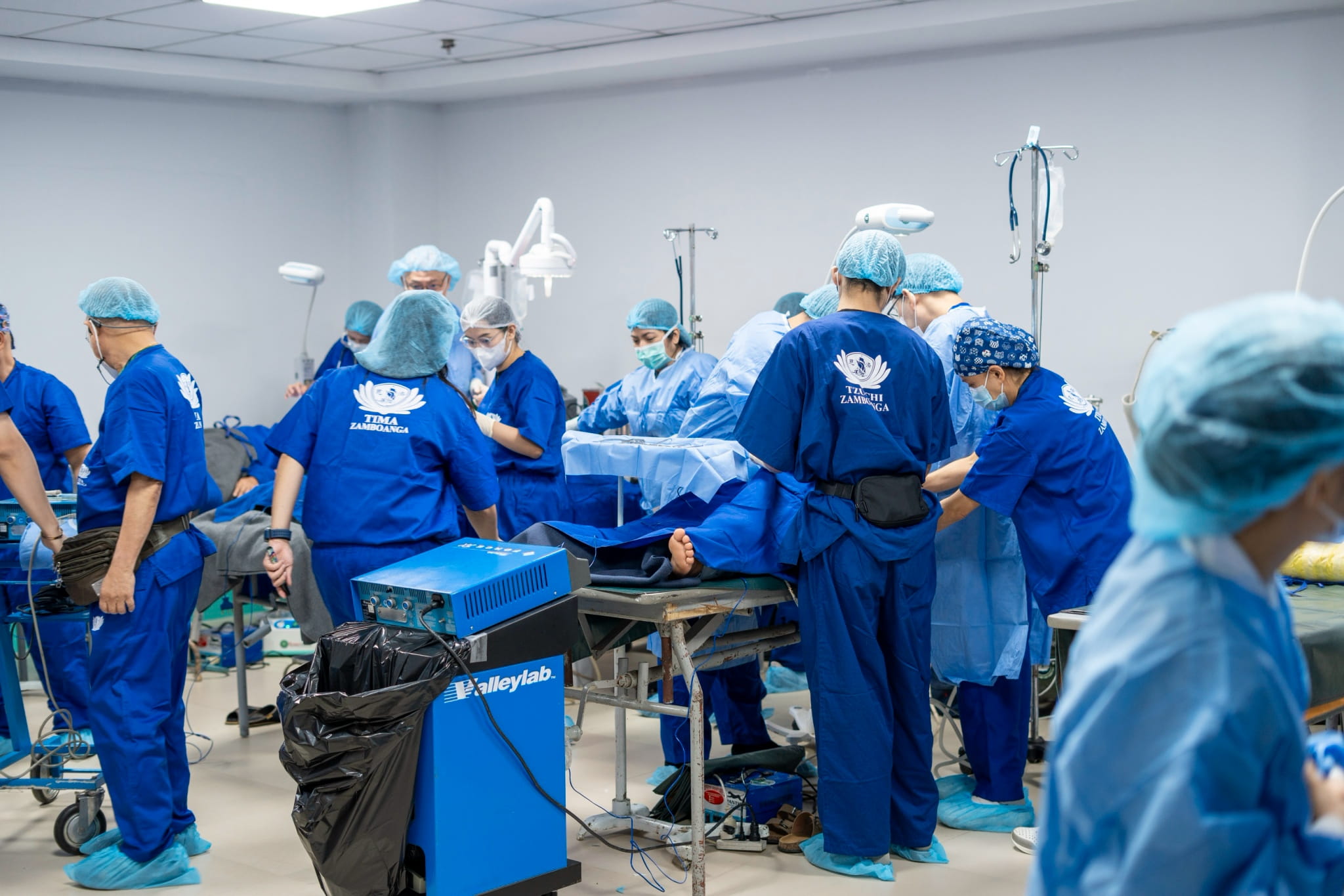 The operating room remains busy and packed as the surgical team performs procedures for patients in need.