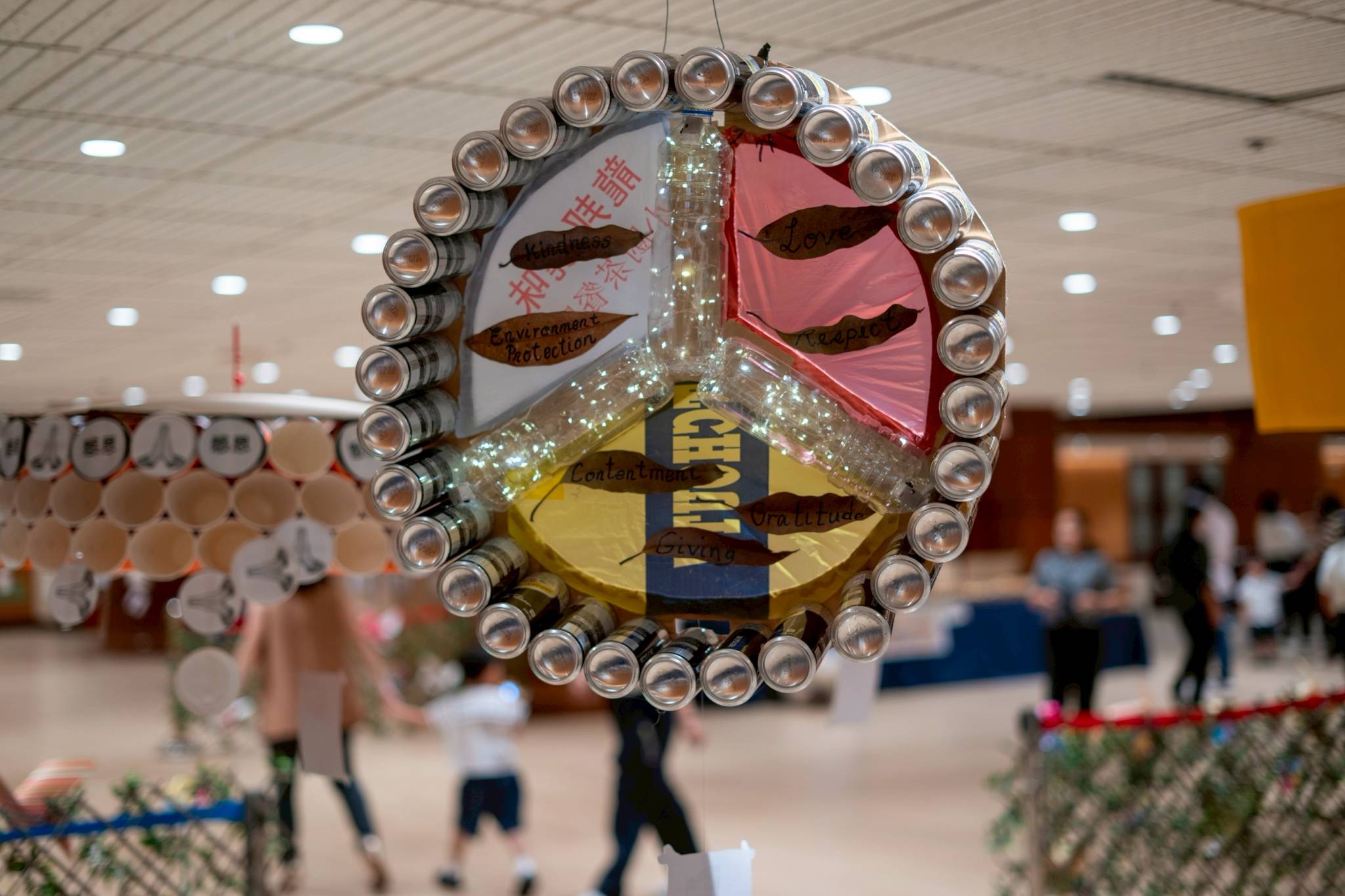 Families made use of recycled materials to put together Peace Lanterns.