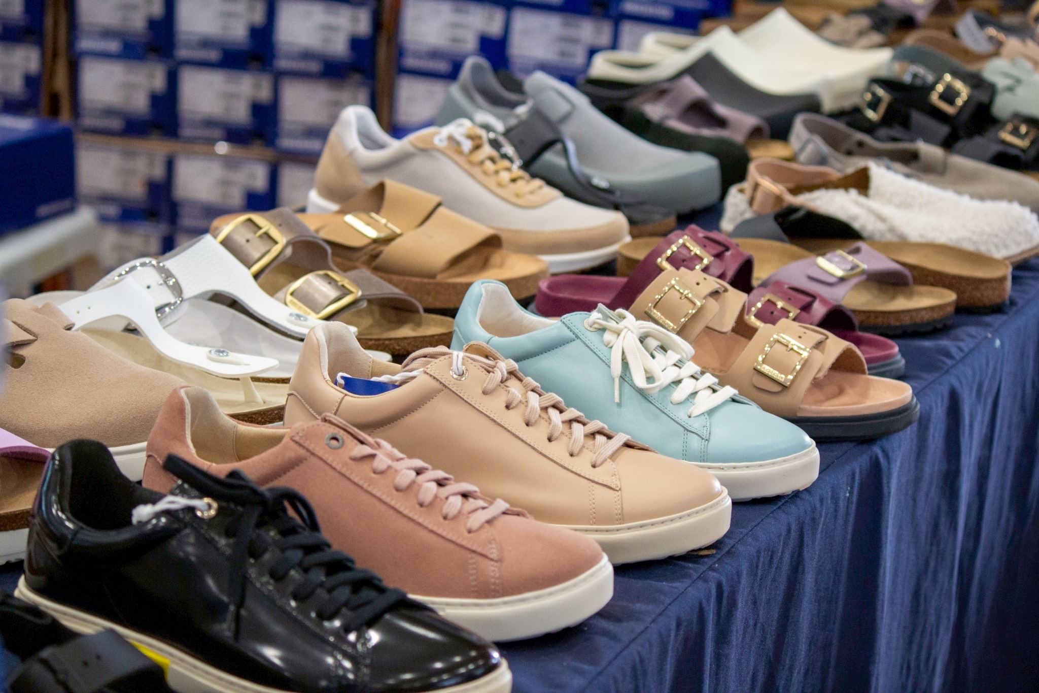 Stylish shoes and sandals are arranged for easy shopping.