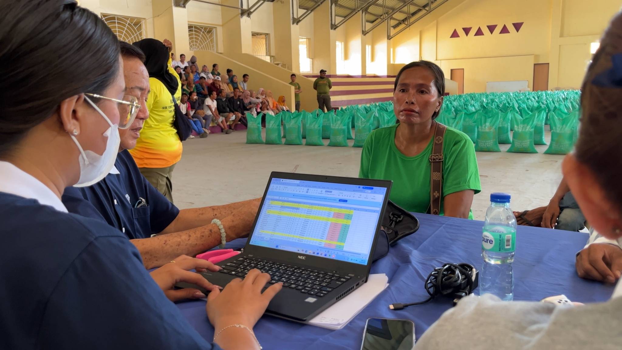 Registration lines were opened prior to the release  of stubs, and beneficiaries brought identification  cards for verification. 