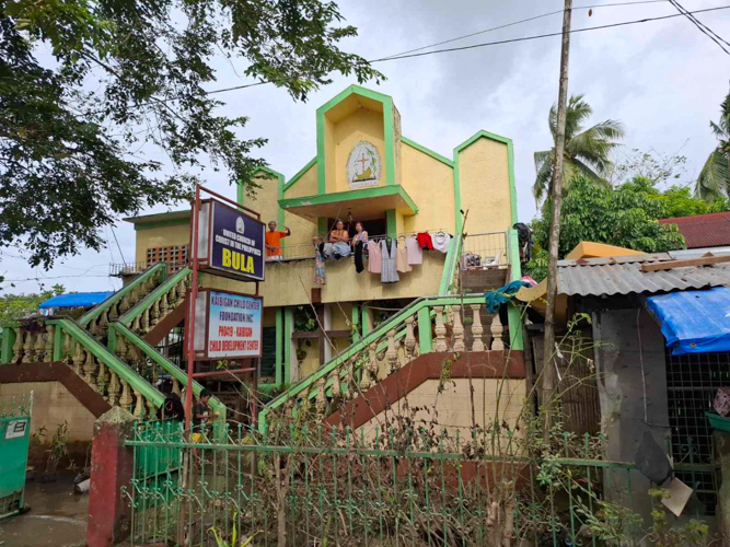 Families affected by Tropical storm Kristine remain stranded in their local church.