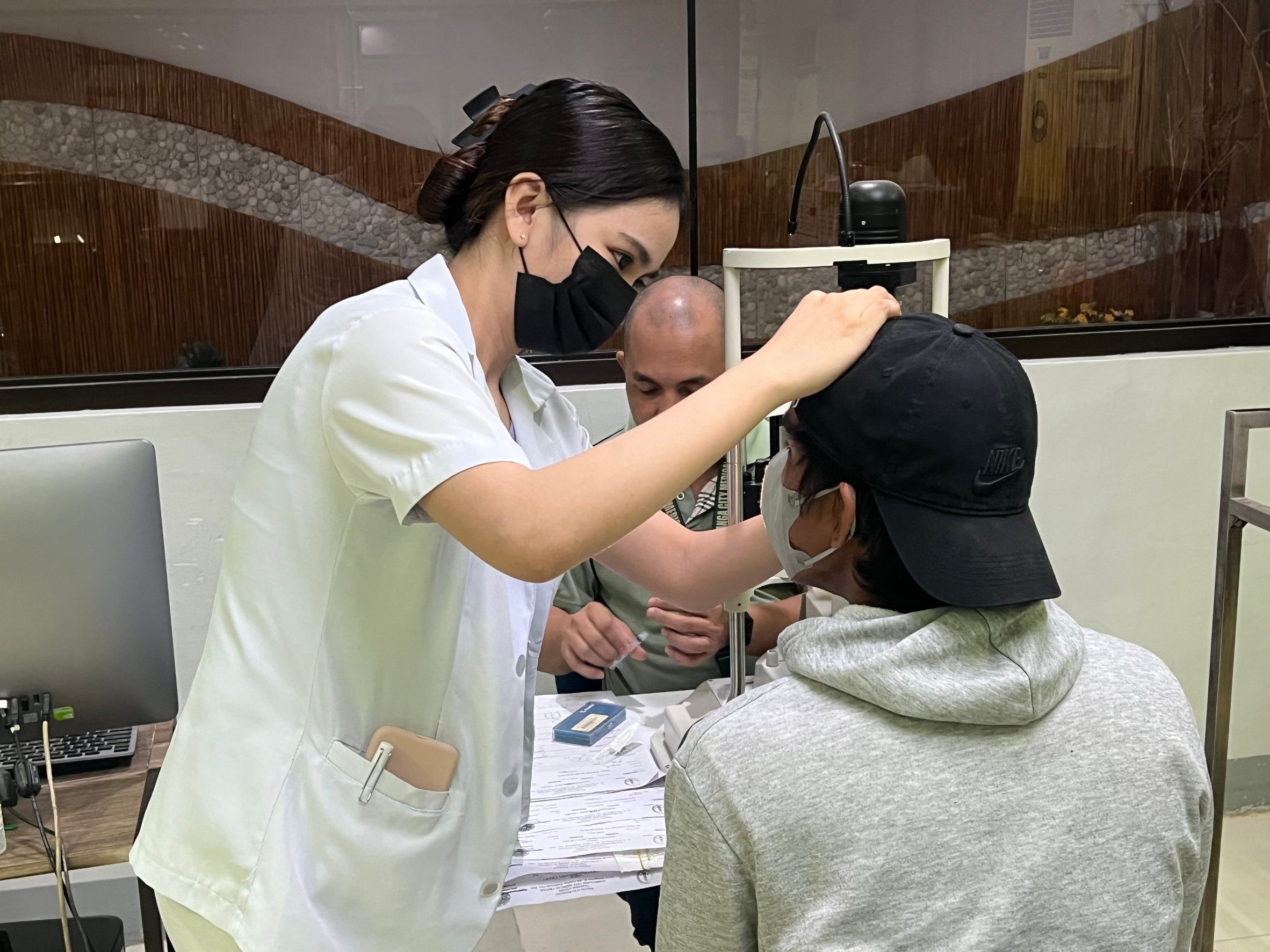 Andrea Bonife Ibañez gains hands-on training experience at Zamboanga Tzu Chi Great Love Eye Center, where she assesses and diagnoses people with vision problems.