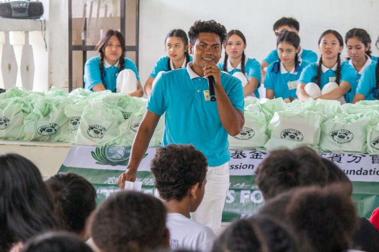 Gerald De Guzman helps in facilitating the outreach activity.