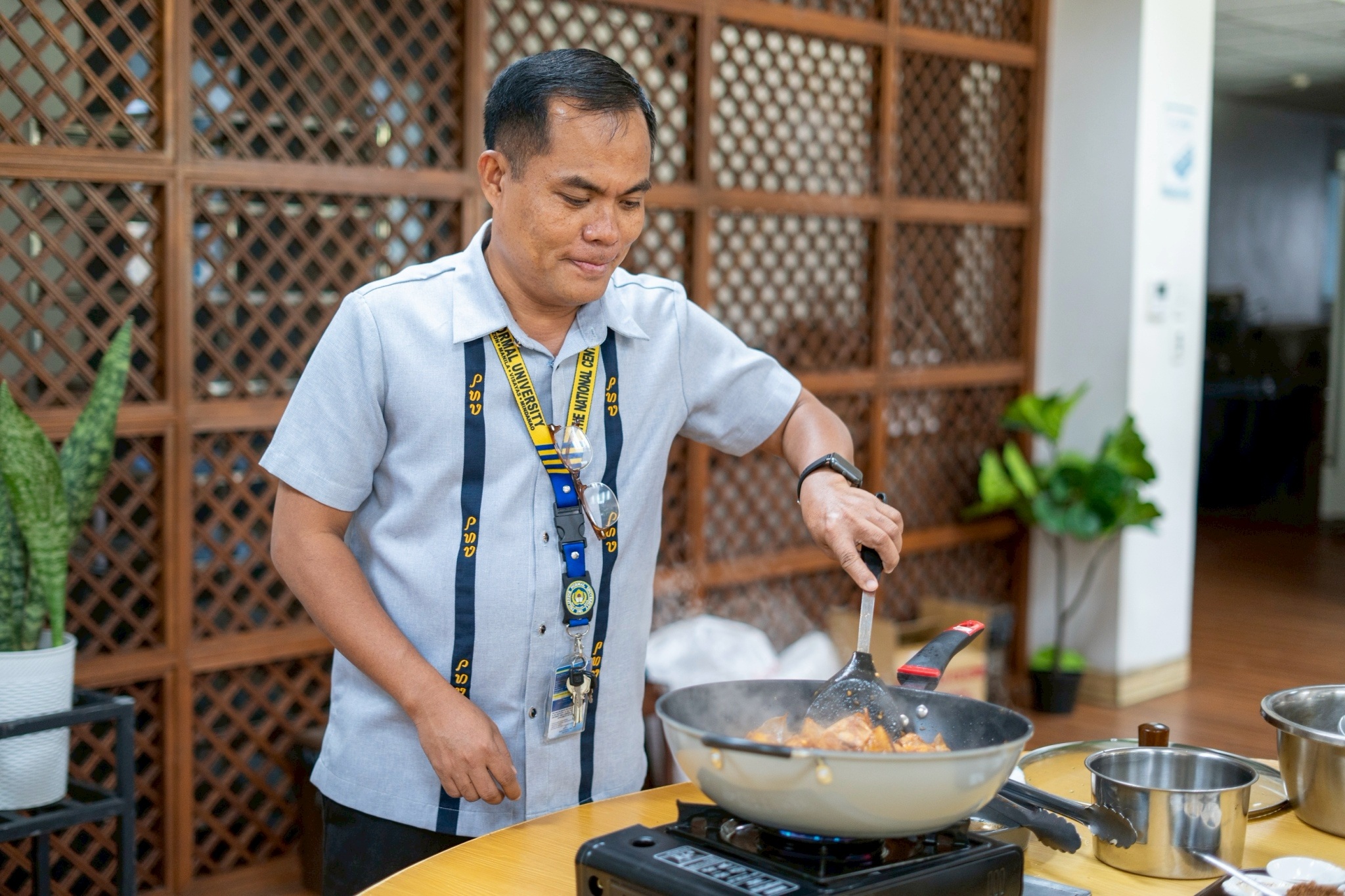 Joseph Luceño, director of Auxiliary Services and Business Development at PNU, actively participated in preparing and tasting the dishes.