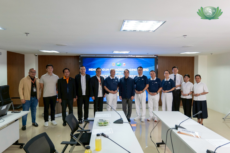 Representatives from the Office of Civil Defense and Tzu Chi Foundation Philippines pose together for a group photo after a successful MoU signing.