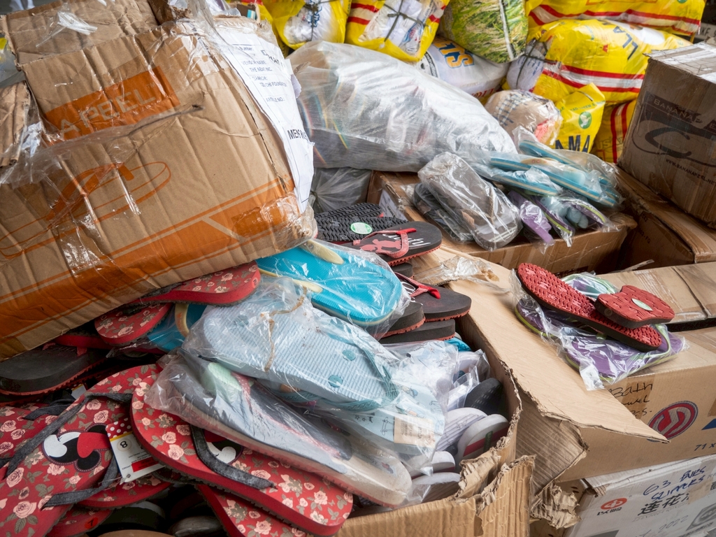 Slippers in all sizes are provided for beneficiaries, young and old.