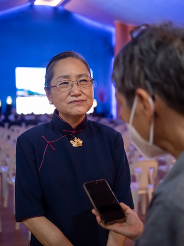 Of the Sutra of Immeasurable (Infinite) Meanings, Tzu Chi volunteer Ophelia Sy says “We would like to spread this news so more people will know about it and we can cultivate blessings together.”【Photo by Daniel Lazar】