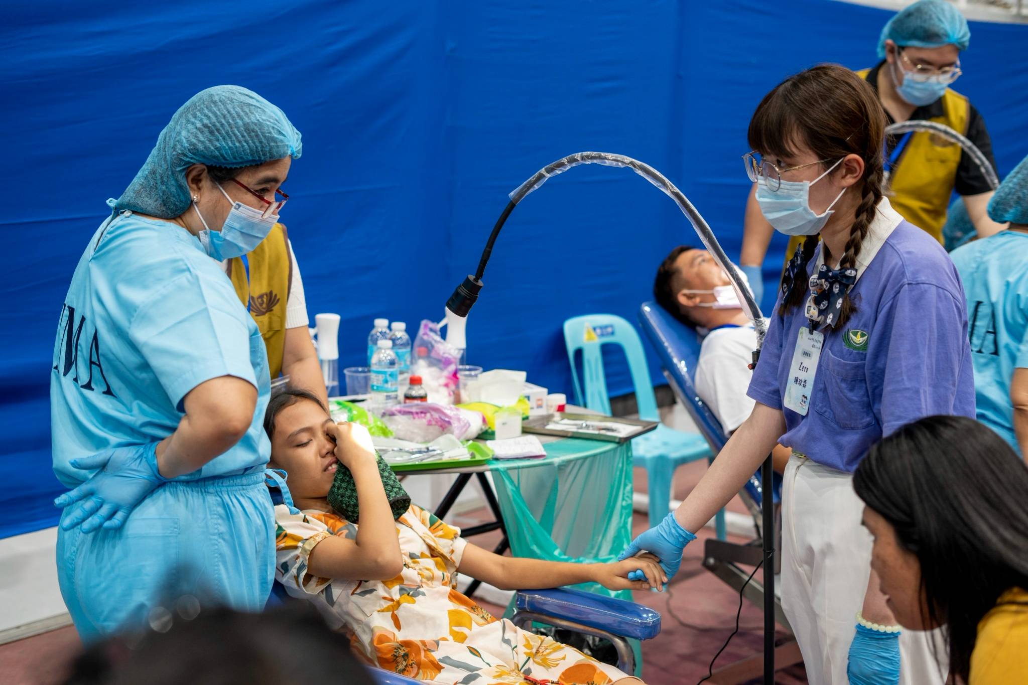 Some Tzu Chings give assistance and comfort to the patients in dental care. 
