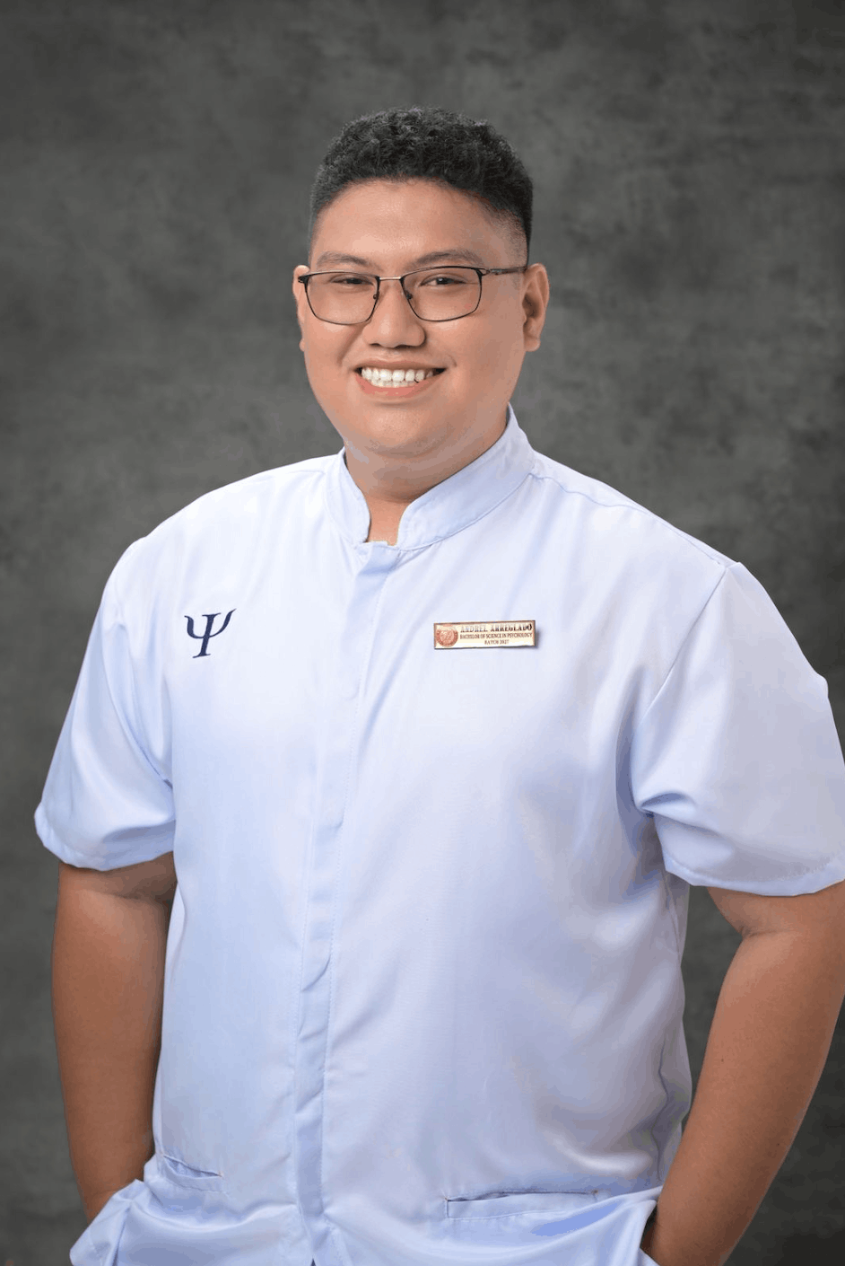 Now an incoming fourth year student taking up BS Psychology from Cebu Normal University, Andrel proudly shows off his new uniform during his pinning ceremony /Photo courtesy of Andrel Arreglado.