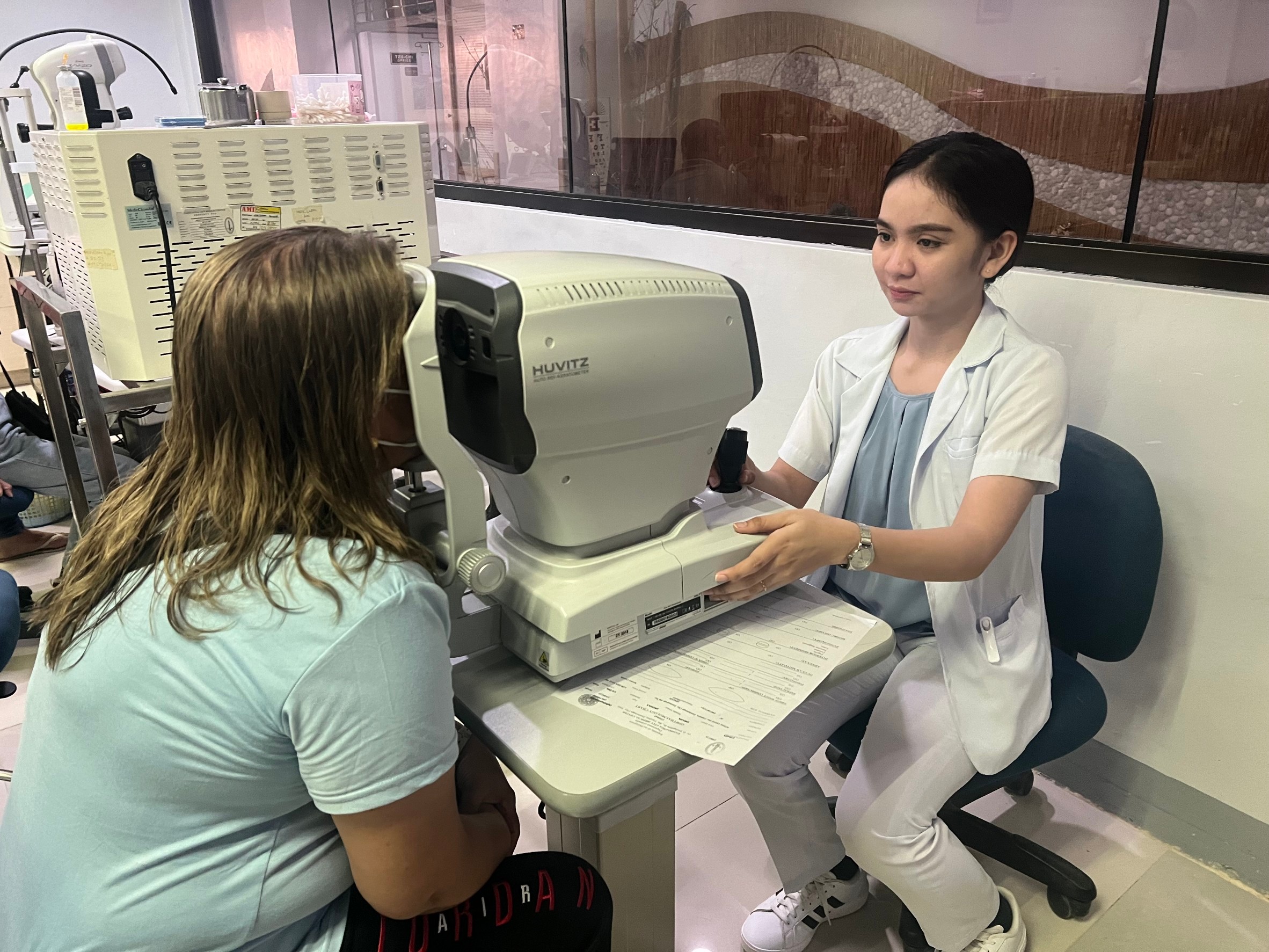 Andrea Bonife Ibañez gains hands-on training experience at Zamboanga Tzu Chi Great Love Eye Center, where she assesses and diagnoses people with vision problems.