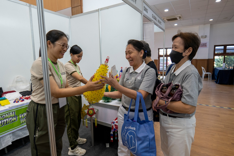 Through Melani Mapili (first from left), Mandaluyong’s Correctional Institution for Women was able to sell products handmade by its Persons Deprived of Liberty at Tzu Chi’s vegetarian and lifestyle fair Fiesta Verde last November 2024.