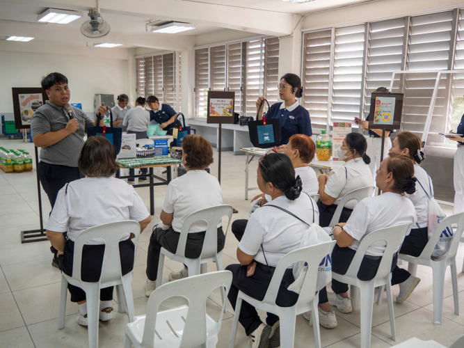 Bags made from discarded denim, seat covers and floor mats woven together from excess sport sock material, and all-purpose cleaner mixed from fruit and vegetable peeling were showcased by volunteers at Tzu Chi’s upcycling center.