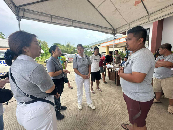 Tzu Chi Bicol volunteers and staff survey affected residents on their needs and situation.