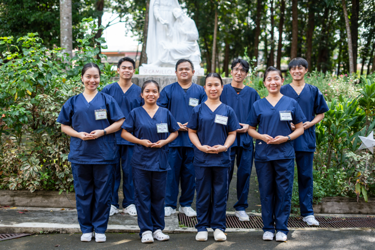 Tzu Chi’s Caregiving Scholars at Camillus Medhaven Nursing Home smile for a group photo on their last day of on-the-job training.