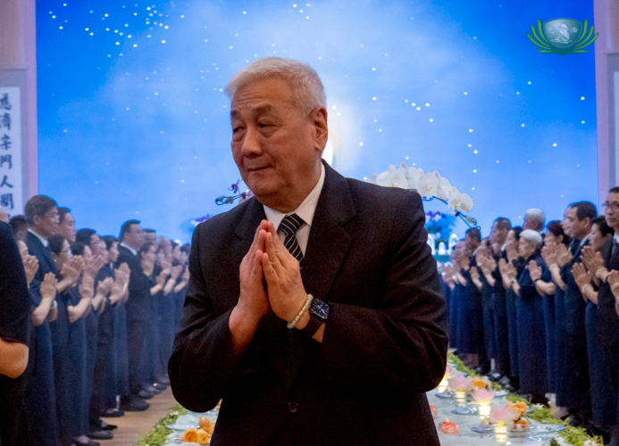 Tzu Chi Philippines CEO Henry Yuñez leads Buddhist monks and special guests during a walking meditation of the Buddha Bathing ceremony.