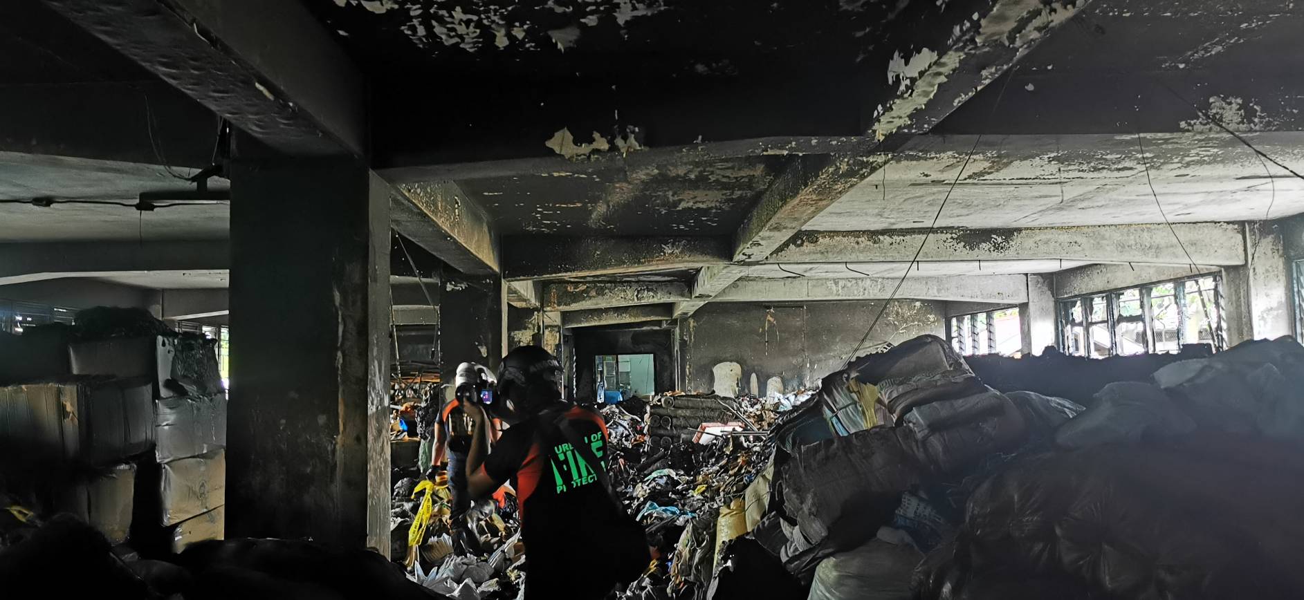 Inside the burned out building after the fire had been extinguished. 【Photo by Johnny Kwok】