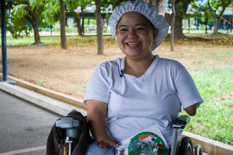 Despite her congenital defects, Donna Adangla maintains a sense of humor about her condition. “If I were born able-bodied maybe I would not have met Tzu Chi,” she quips. 【Photo by Matt Serrano】