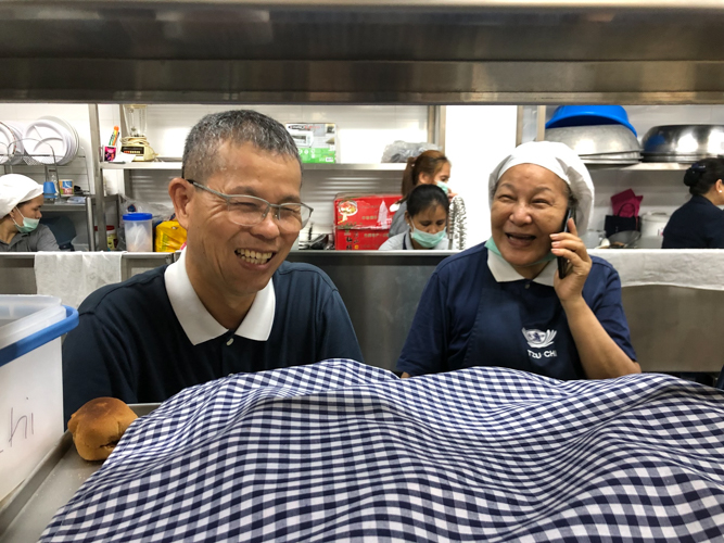 “So much of my life has changed because of Tzu Chi,” says Manny Go (left). 