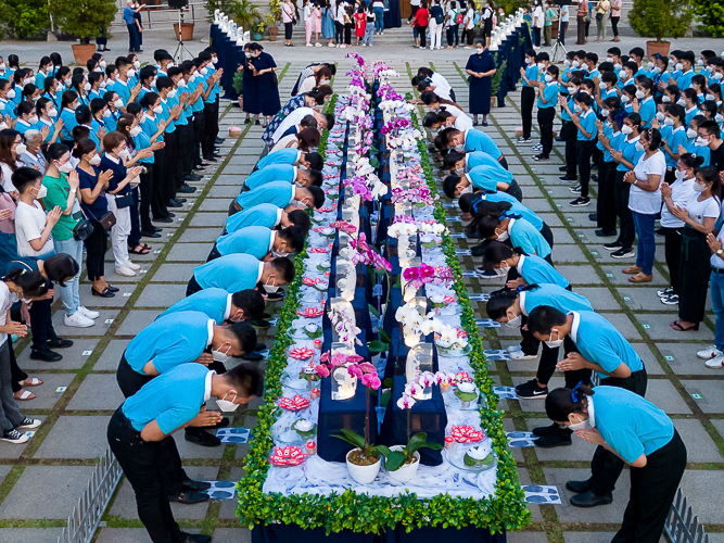 Showing gratitude. Scholars participate in the annual Buddha Bathing Ceremony, a solemn ritual of reflection, repentance, and renewal.