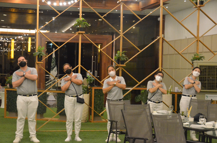 Guests and volunteers participate in the performance of a sign language song. 【Photo by Divina Villacrusis】