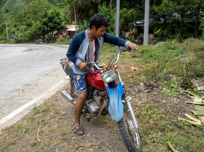 Through the reliable earnings generated by banana harvesting, Eric secured a motorcycle via monthly installments, enhancing transportation to the market for buying and selling goods that benefit his family. 【Photo by Matt Serrano】