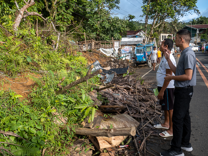 Gerry Hibon loses his home and sari-sari store in Brgy. Bayho, Lope de Vega, to a landslide triggered by incessant rains. 【Photo by Matt Serrano】
