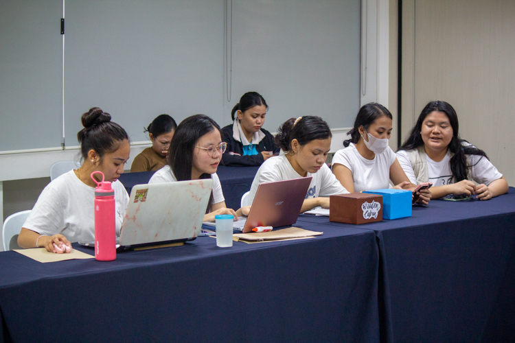 Members of the activities team prepare the different camp games and tasks.