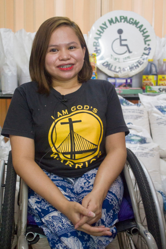 A resident of Bahay Mapagmahal when she was 6 years old, Donna Rose Tidalgo has since earned her Bachelor of Science in Special Education from Trinity University of Asia. She also plays for Rondalla on Wheels. 【Photo by Matt Serrano】