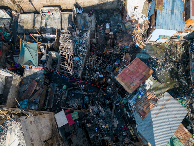 Arial view of the area affected by the fire in Barangay 330, Sta. Cruz, Manila, last February 15. 【Photo by Harold Alzaga】