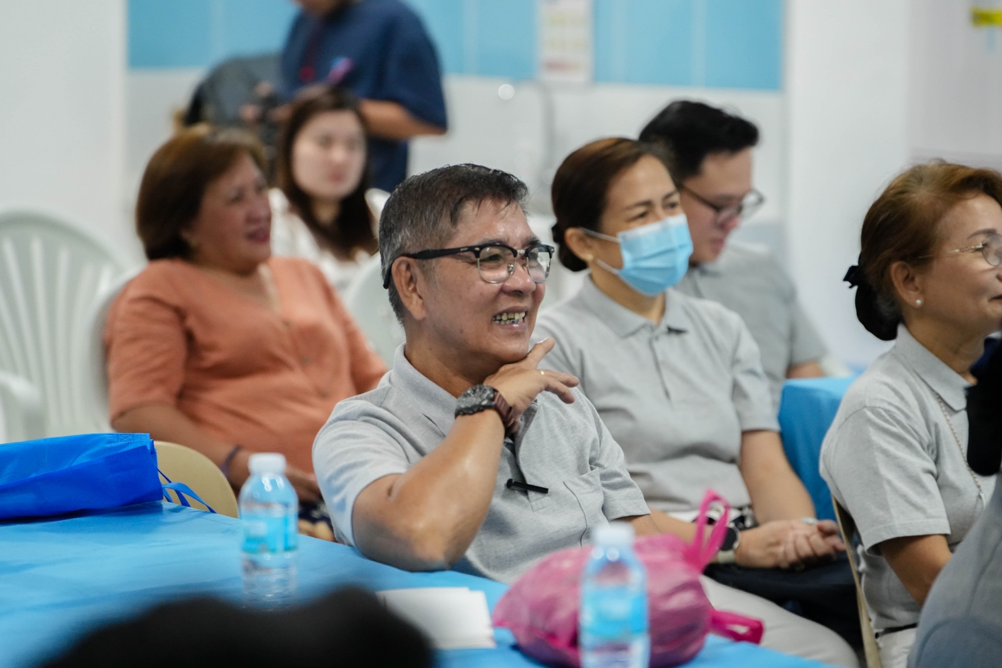 Tzu Chi Bicol volunteers are happy with news of the donated hospital equipment. 