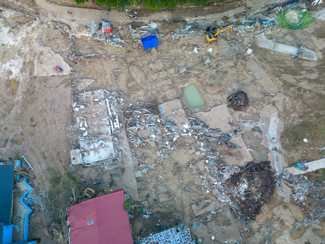 The aerial shot of Tamiao, Compostela, Cebu, shows the great extent of damages brought about by Typhoon Tino.