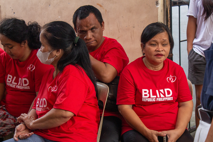 Members of the Blind Republic Philippines begin to arrive at their small gathering.  【Photo by Marella Saldonido】