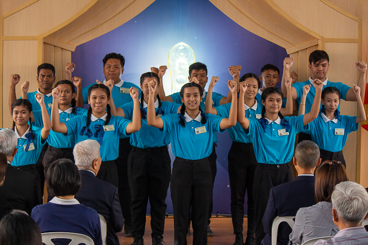 Compassion in action. Tzu Chi is known for accompanying its songs with actions, making for a more expressive interpretation.