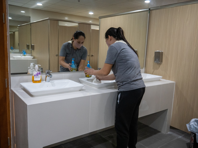 Restrooms are one of the most frequently used places of a big event like Fiesta Verde, and this housekeeping staffer makes sure that they are always clean. 