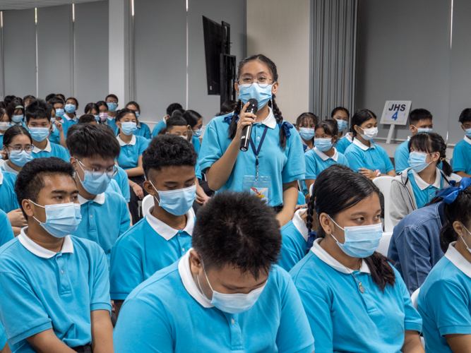 A scholar volunteers during a Humanity Class sharing session. 【Photo by Matt Serrano】