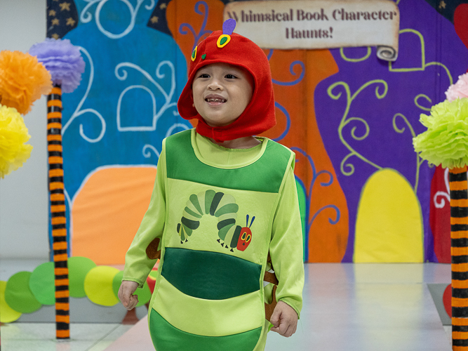 Students proudly display their whimsical book character costumes in a lively fashion show. 【Photo by Marella Saldonido】