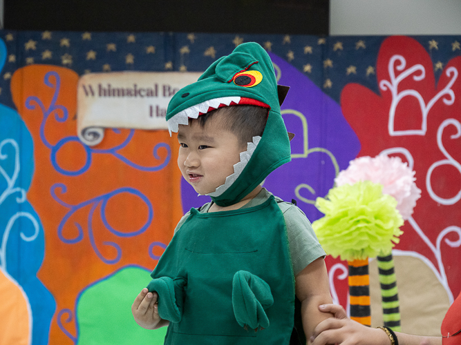 Students proudly display their whimsical book character costumes in a lively fashion show. 【Photo by Marella Saldonido】