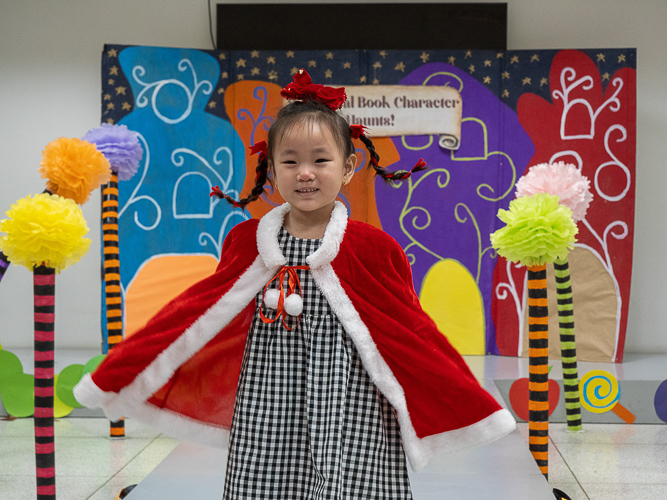 Students proudly display their whimsical book character costumes in a lively fashion show. 【Photo by Marella Saldonido】