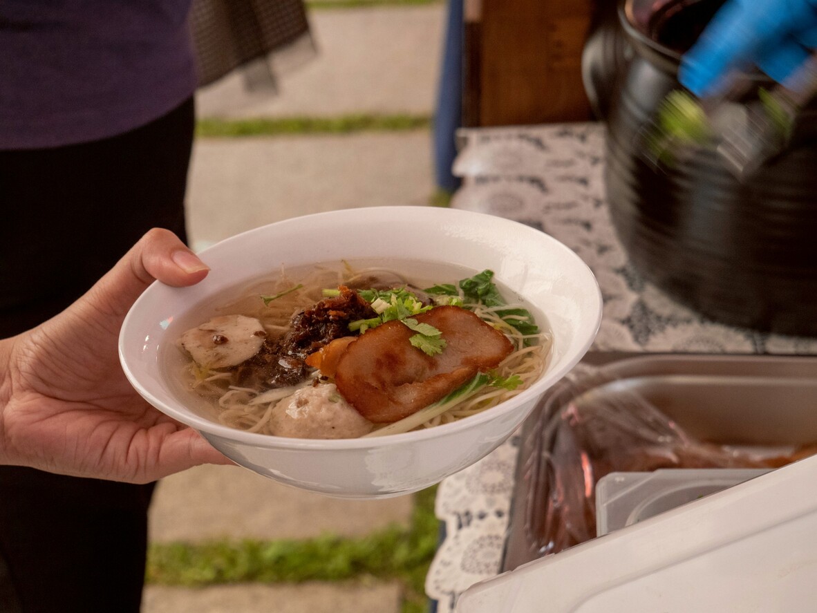 Hearty soups with vegetables, noodles, and meat alternatives are perfect for the event’s rainy weather.