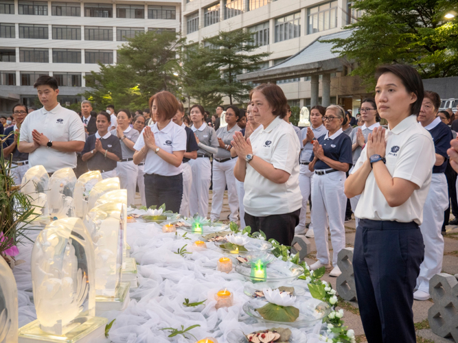 Members of the Tzu Chi International Medical Association (TIMA) take their turn for the Buddha Bathing Ceremony.
