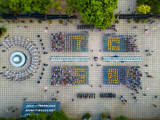 Aerial shot of the Buddha Bathing Ceremony for the 3-in-1 celebration of Buddha Day, Mother’s Day, and Tzu Chi Day on May 12, 2024 at the Buddhist Tzu Chi Campus in Sta. Mesa, Manila.