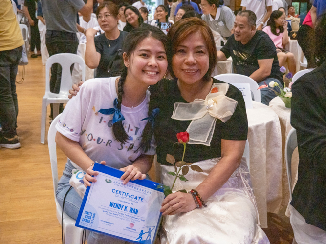 After two days of being away from each other, youth camp participants and their parents, guardians, and siblings are reunited at the Jing Si Hall. 