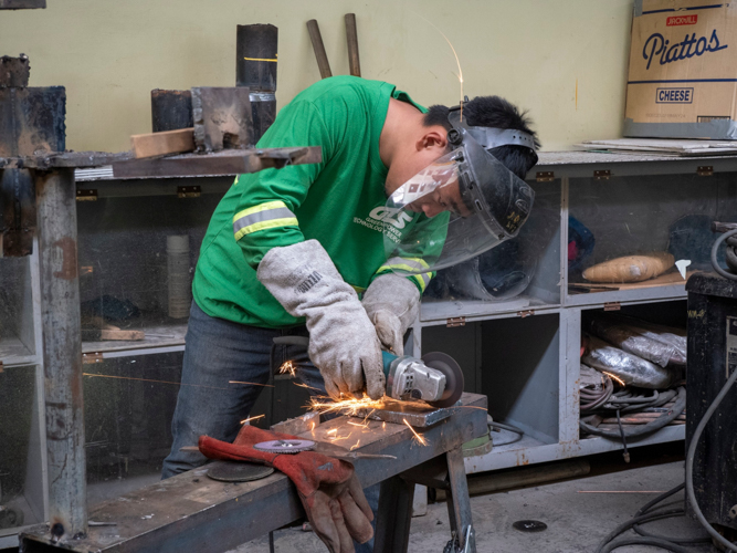 Novoh John Obligado works on a welding assignment during his on-the-job training. 【Photo by Matt Serrano】