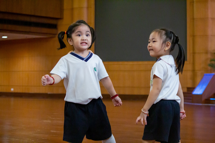 Cuteness overload and contagious smiles light up the room as students bust a move in the classic freeze dance competition. 【Photo by Marella Saldonido】