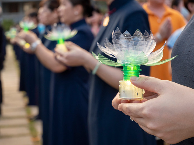 Upcycled lotus candles from collected plastic bottles from the April 21 Earth Day Run were used during the ceremony.